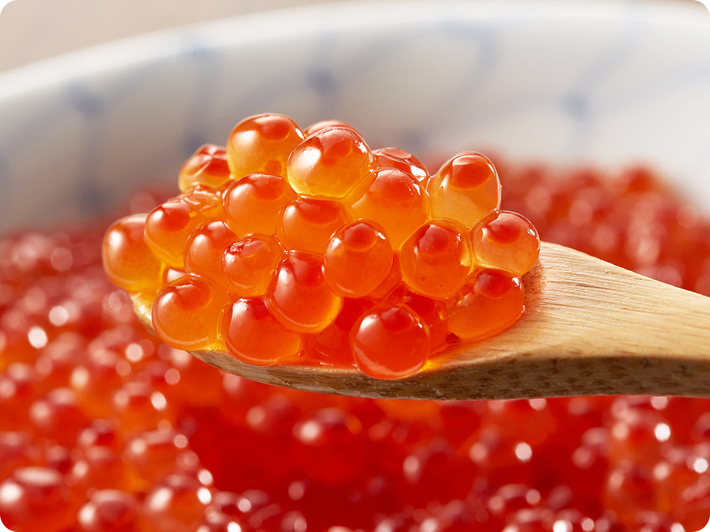 Coho Caviar, Ikura roe, has a light salinity with a beautiful bright salmon color.